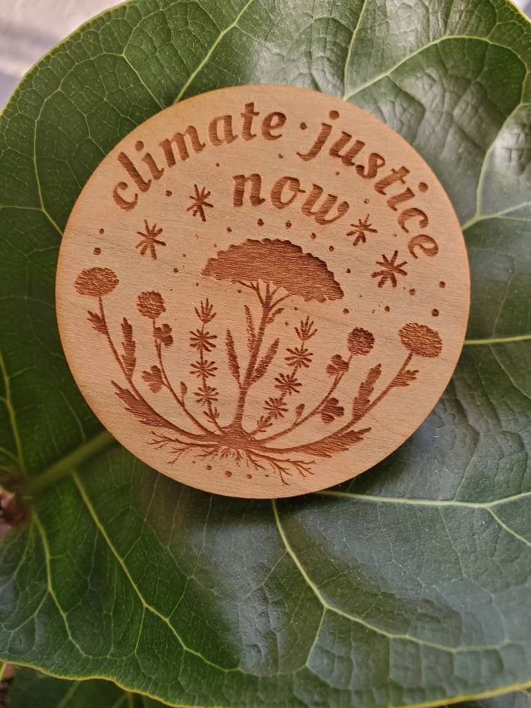 Climate Justice Now Wooden Pin - Cyclical Roots & Cycles Journal – Healing tools & grounding guides for self-awareness & collective wellbeing