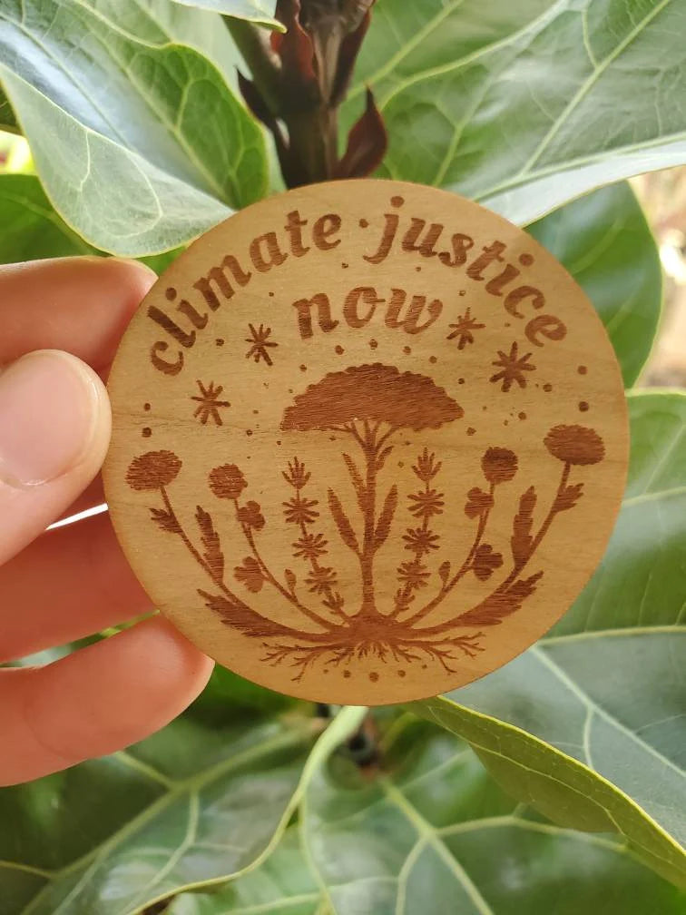 Climate Justice Now Wooden Pin - Cyclical Roots & Cycles Journal – Healing tools & grounding guides for self-awareness & collective wellbeing