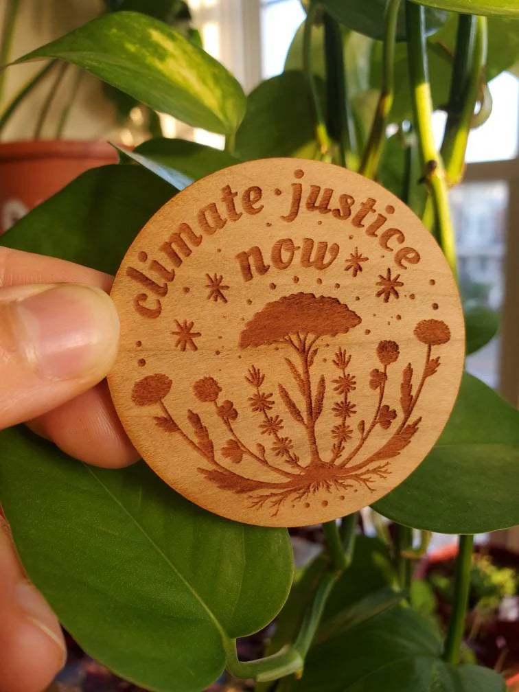 Climate Justice Now Wooden Pin - Cyclical Roots & Cycles Journal – Healing tools & grounding guides for self-awareness & collective wellbeing